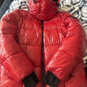 Red Puffer Jacket with Goggles. the recycled planet M